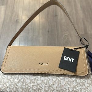 Camel and beige DKNY purse. Brand new never used still has tags on it.